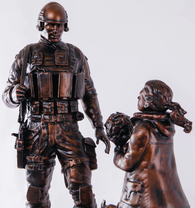 Statuette of beech "Polite people" on the bedside table